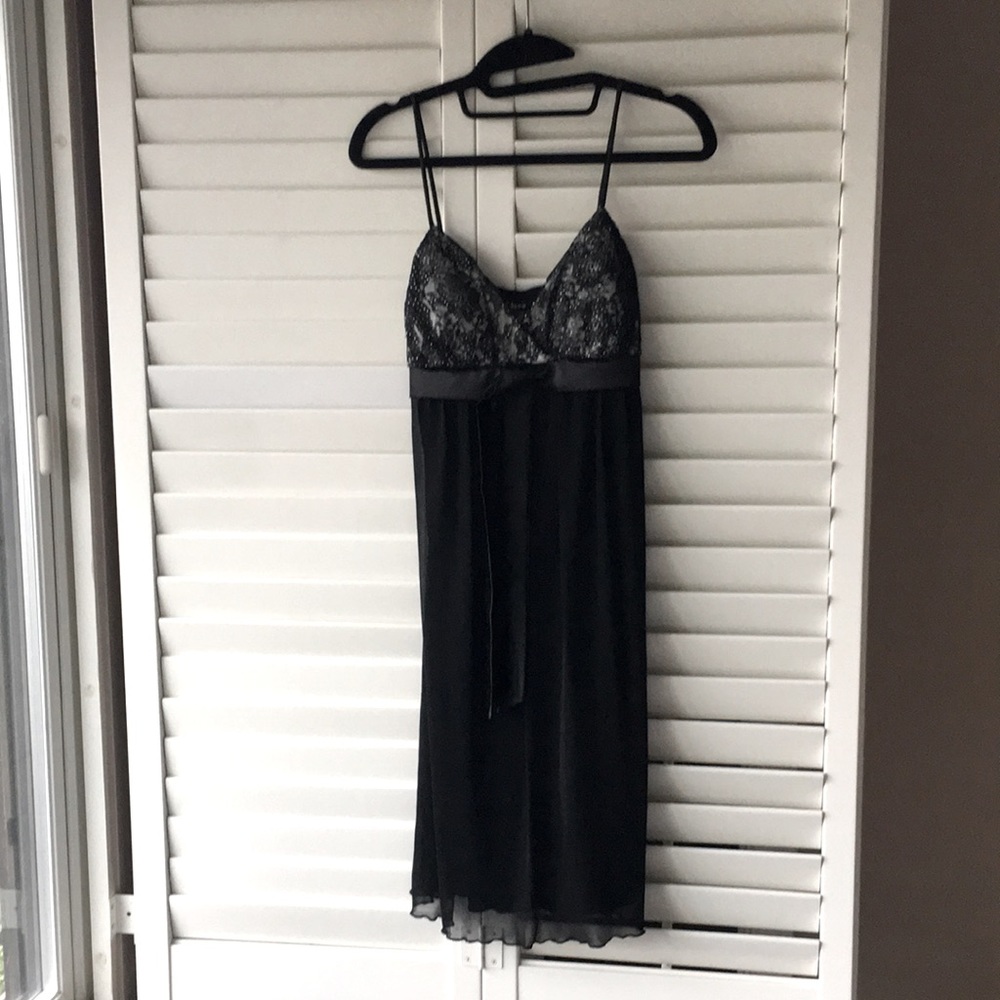 Black dress with floral top and ribbon to tie into bow